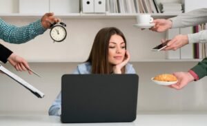 empath woman sitting with a laptop, working on living in alignment with their values | empath integration | Laura Rowe | The Vital Spirit