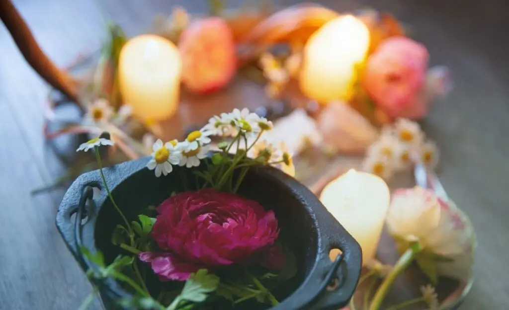 Flower arrangement with candles | Beyond the Law of Attraction | The Vital Spirit | Laura Rowe | Empath Mentor